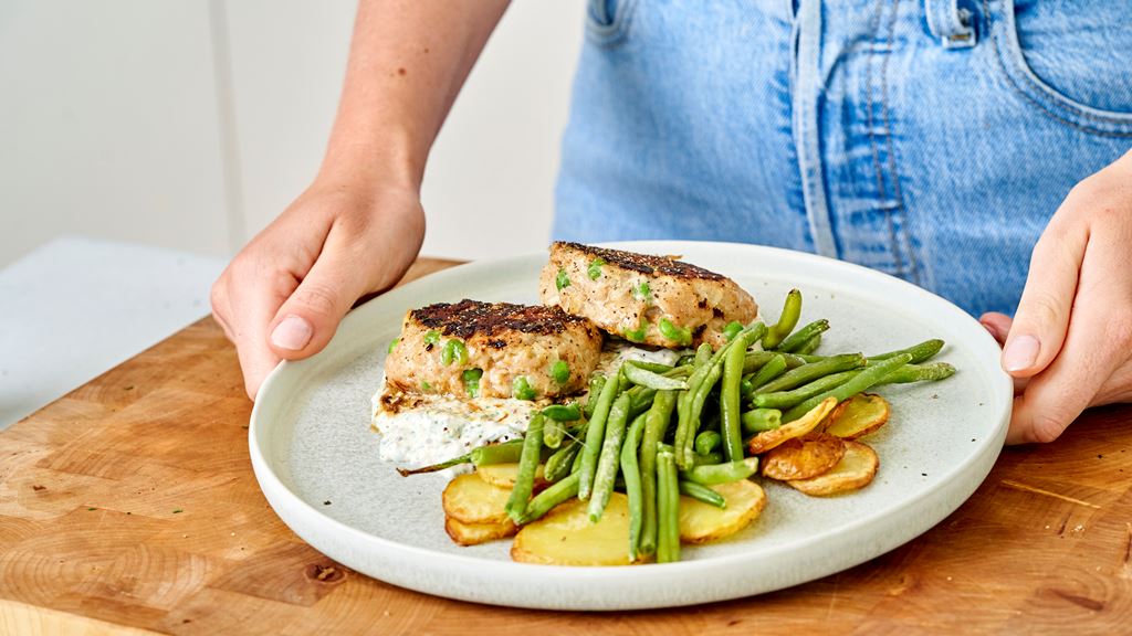Poulet-Erbsen-Burger